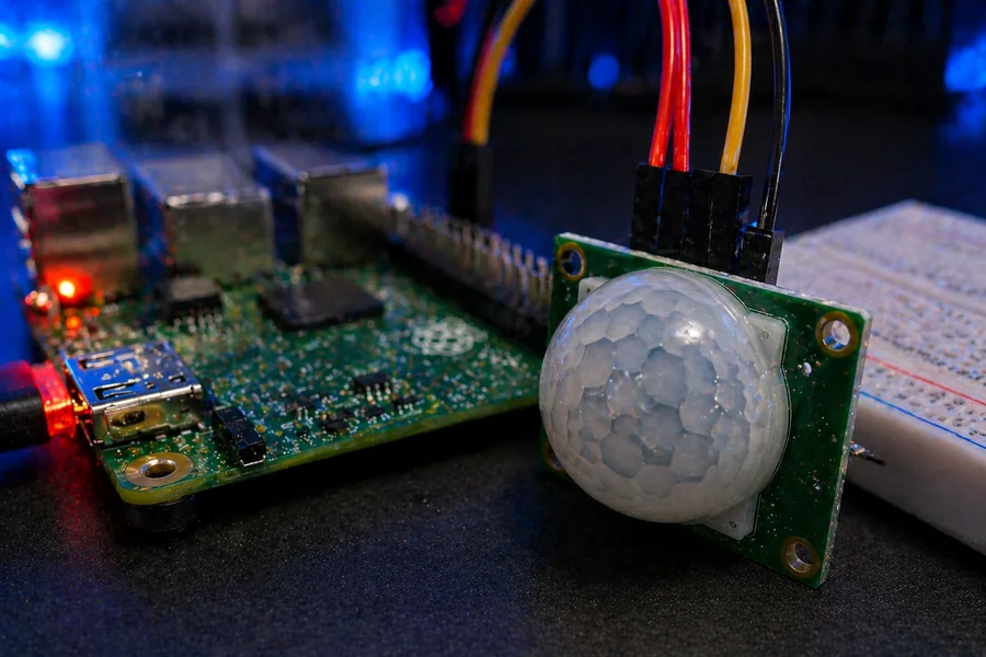 Close-up PIR motion sensor dome and wiring
